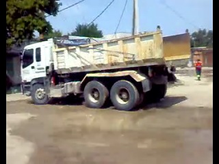 krymsk. one of the morgues. unloading the bodies from the truck magnet. the reception worker voices the number of accepted dead ... next stands more about