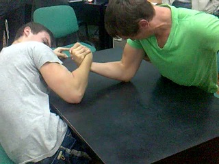 arm wrestling. broke his hand.